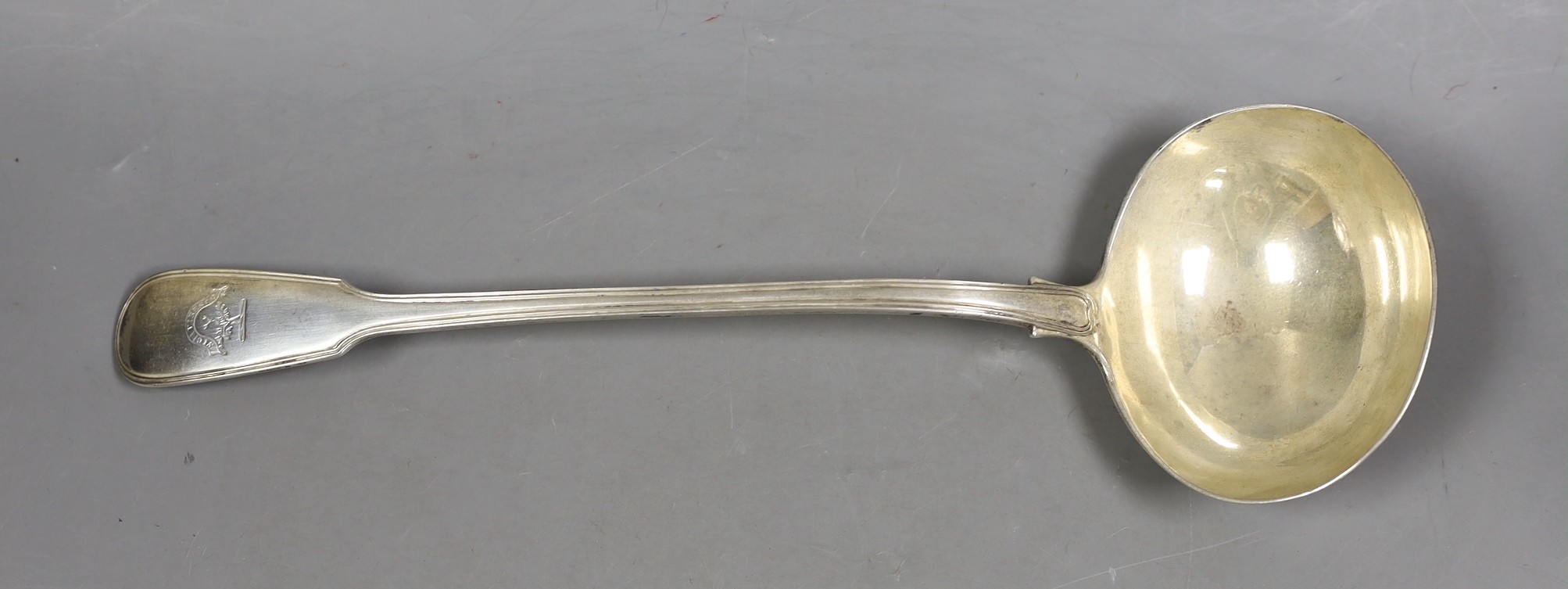 An early Victorian silver fiddle and thread pattern soup ladle, by William Eaton, London, 1845, 34.3cm